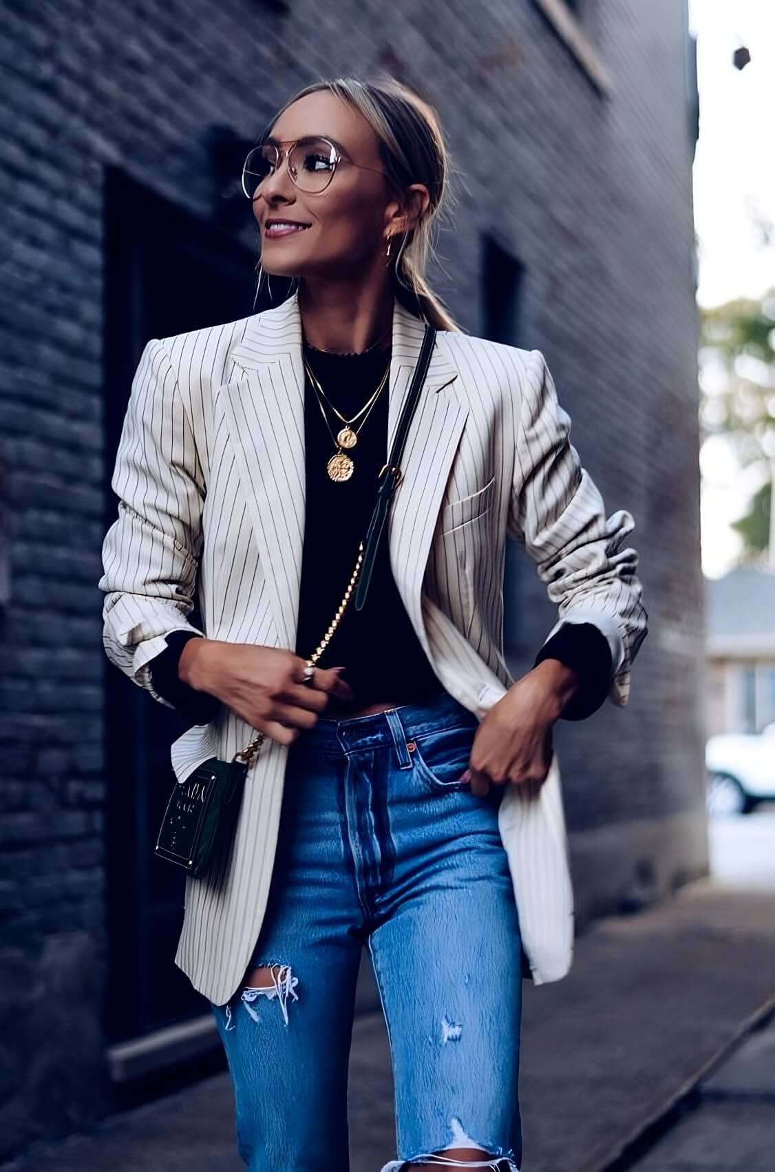 Casual White Blazer With Blue Jeans And Necklace
