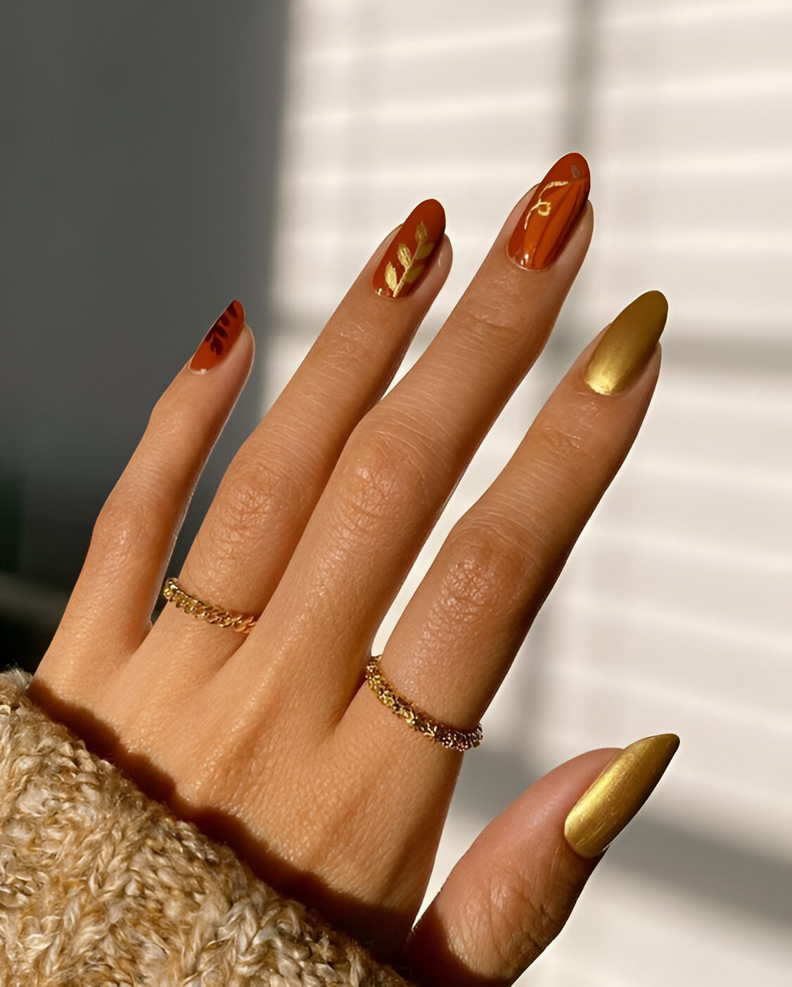 Chic Orange And Gold Nails