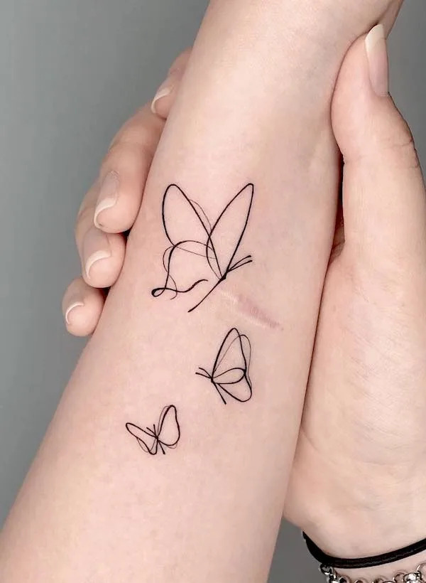 Minimalistic Butterfly Tattoo