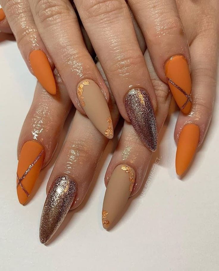 Orange Manicure With Sliver Glitters