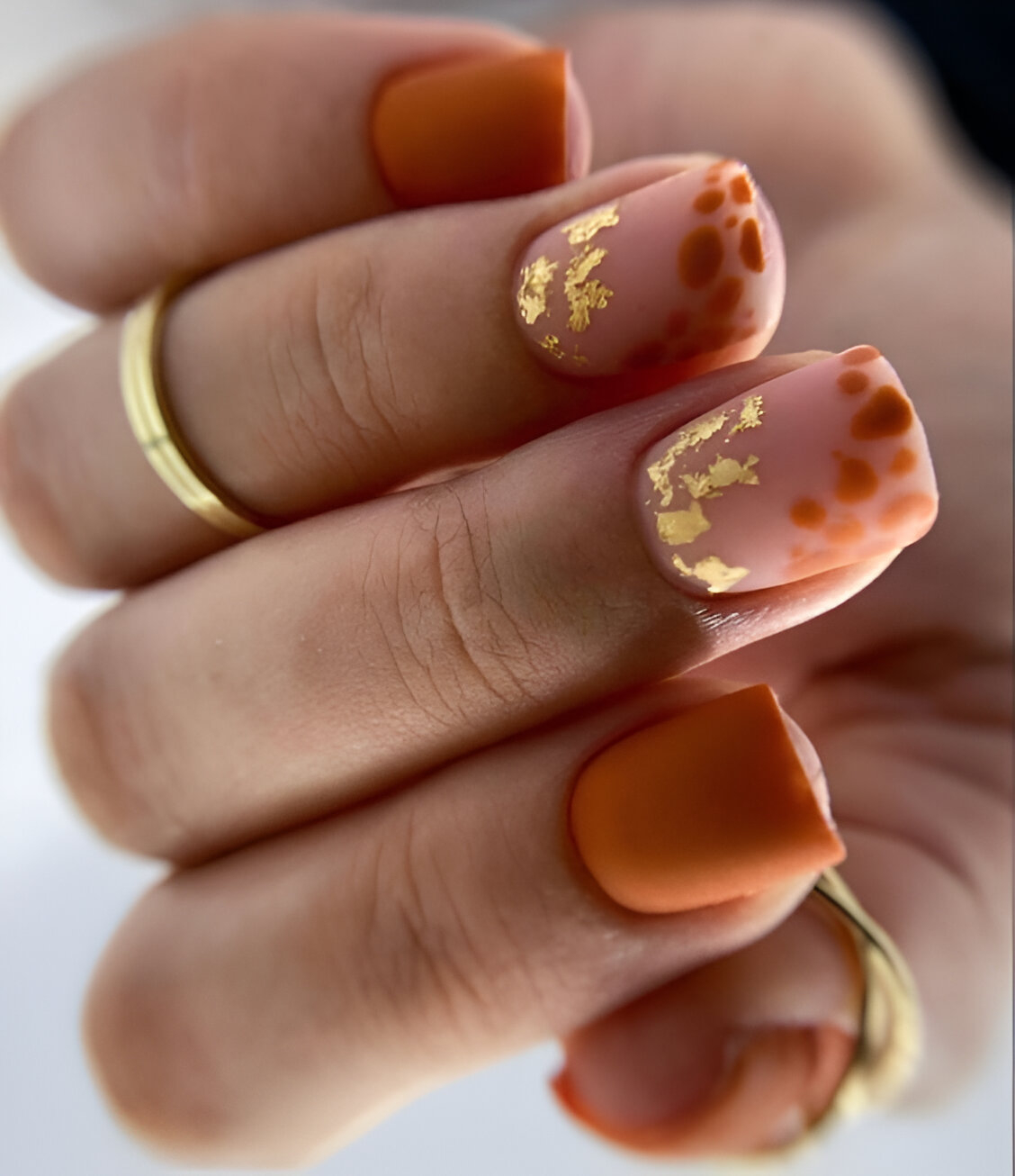 Short Square Orange Nails With Gold Specks