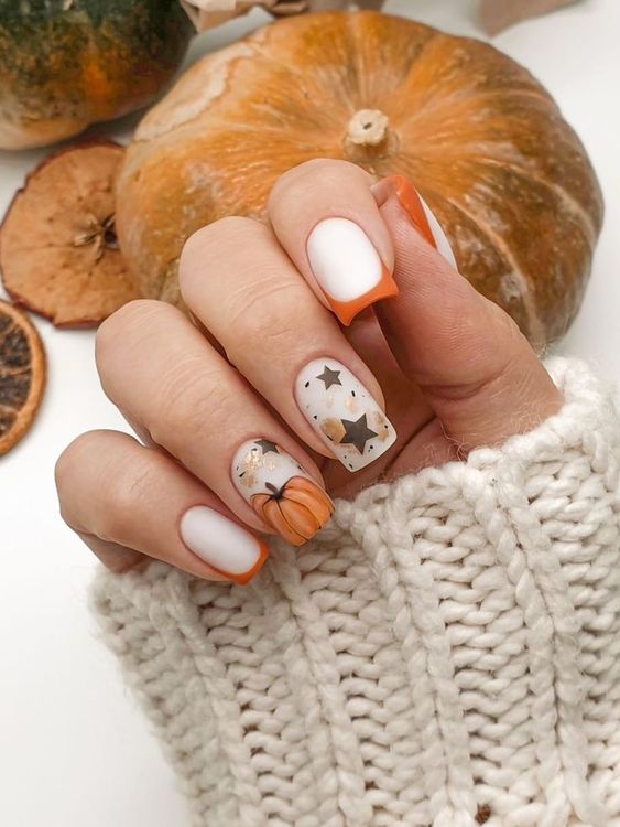 Short Square Orange Nails With Pumpkin Designs