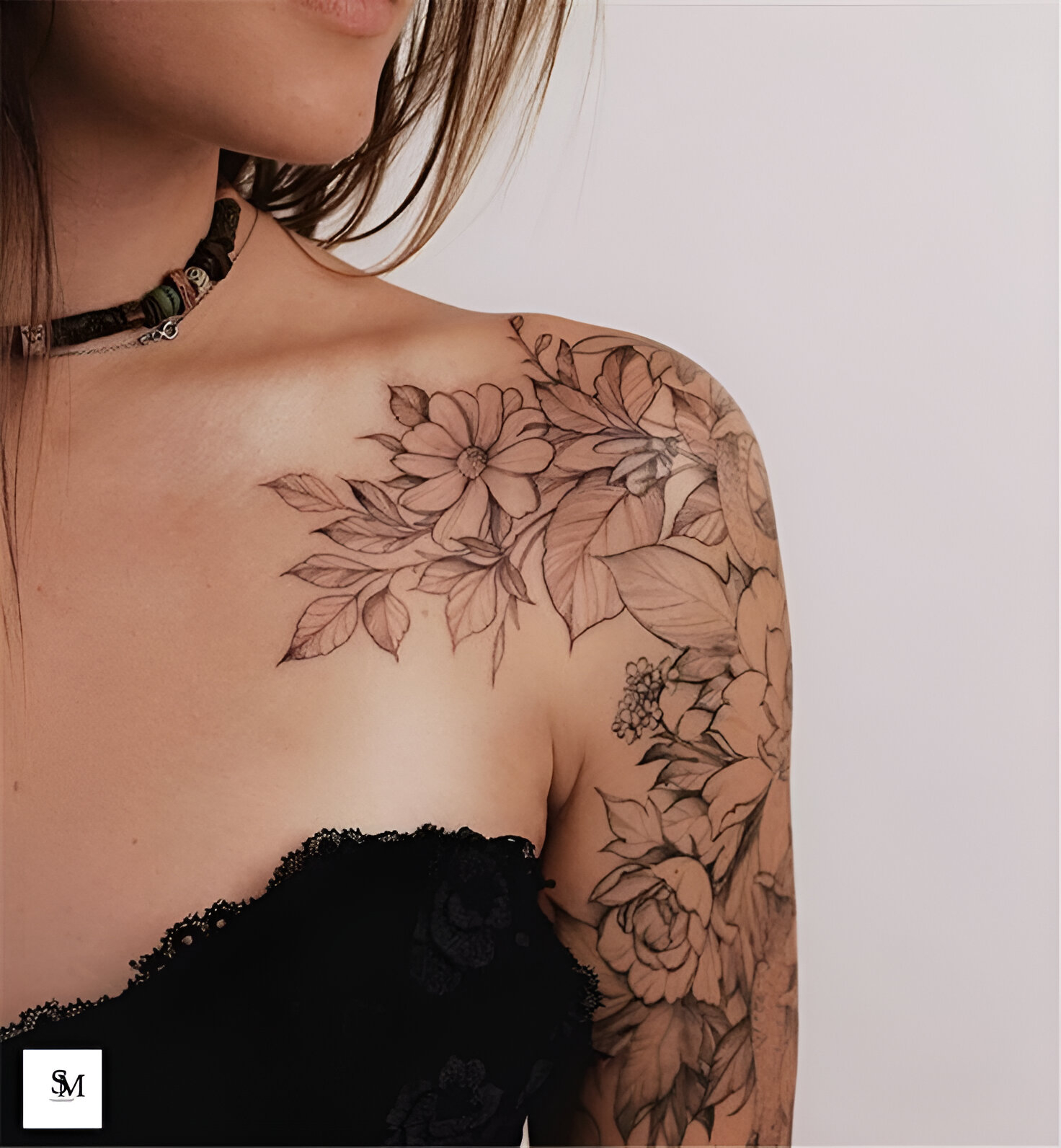 Stunning Shoulder Tattoo With Floral Art