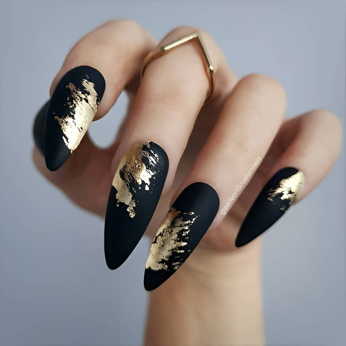 Black And Gold Almond Nails