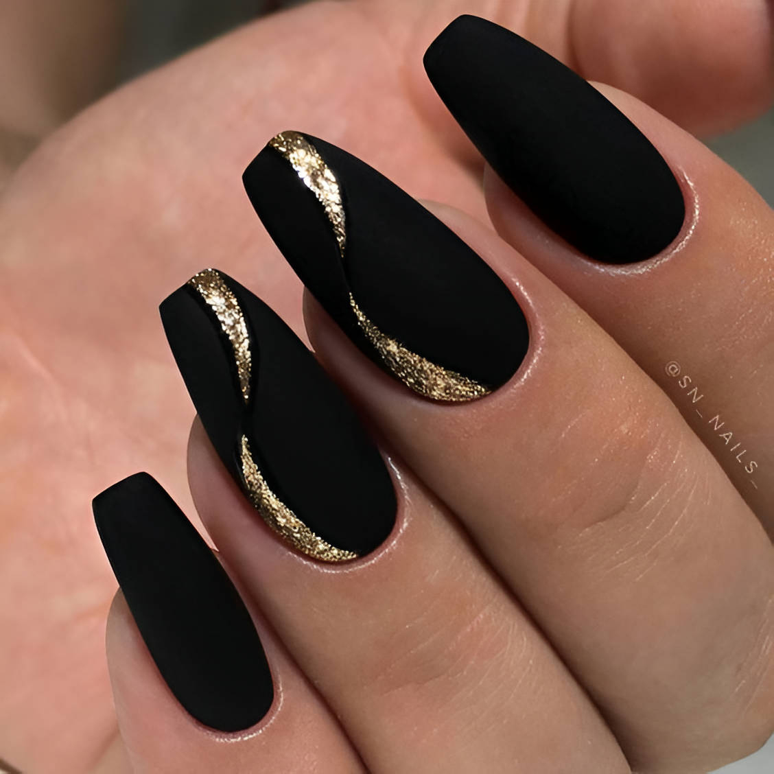 Classy Black And Gold Nail Design