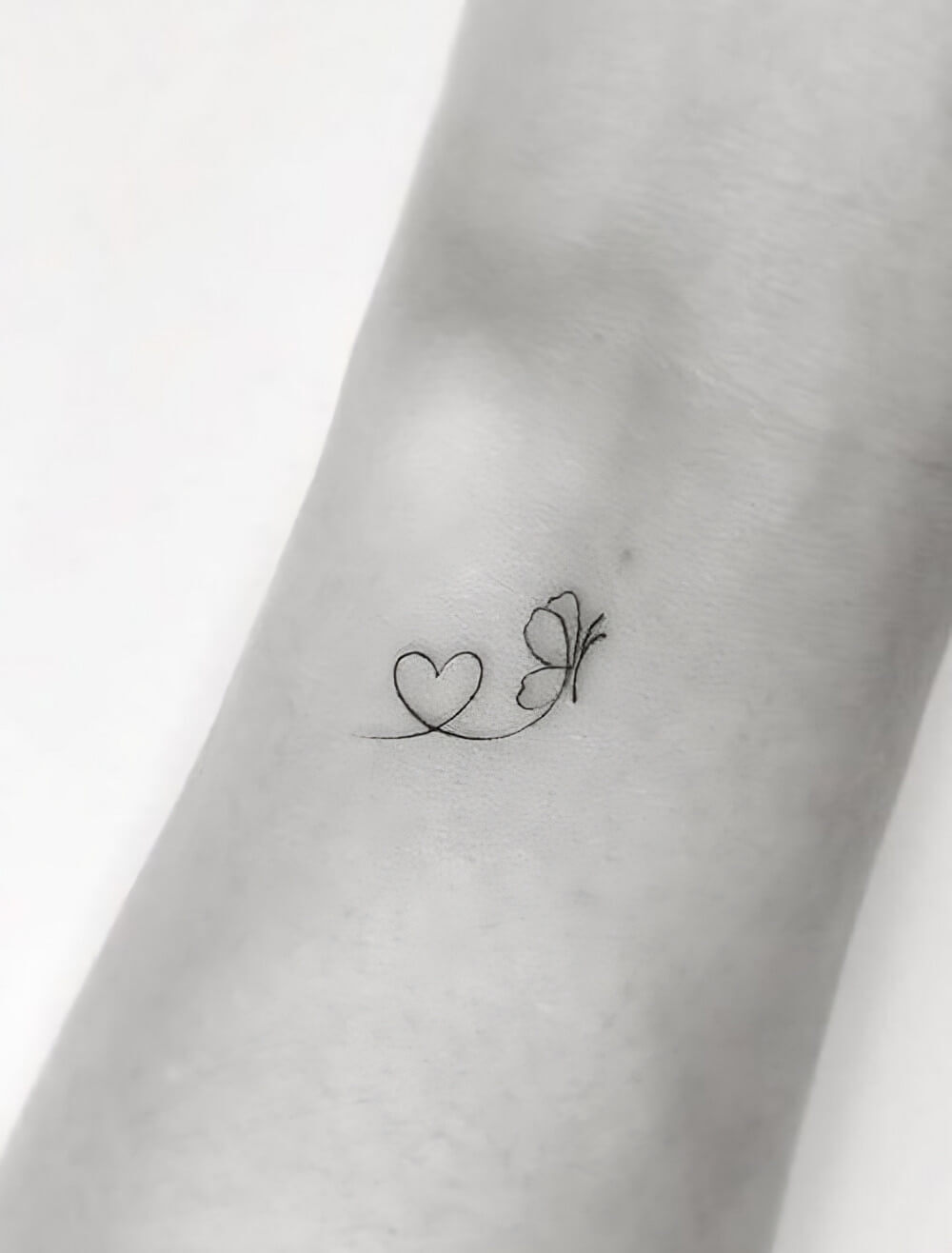 Elegant Heart Tattoo With Butterfly