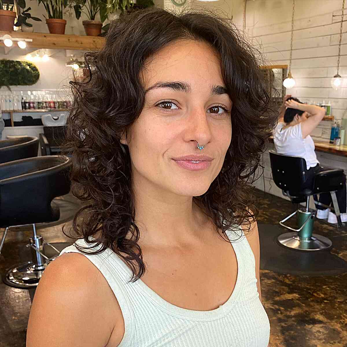 Layered Haircuts For Curly Hair With Middle Part