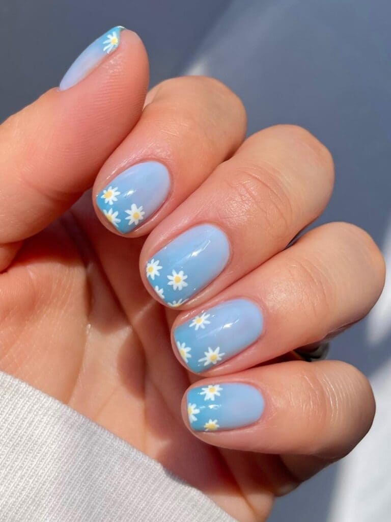 Light Blue Nails With Daisies