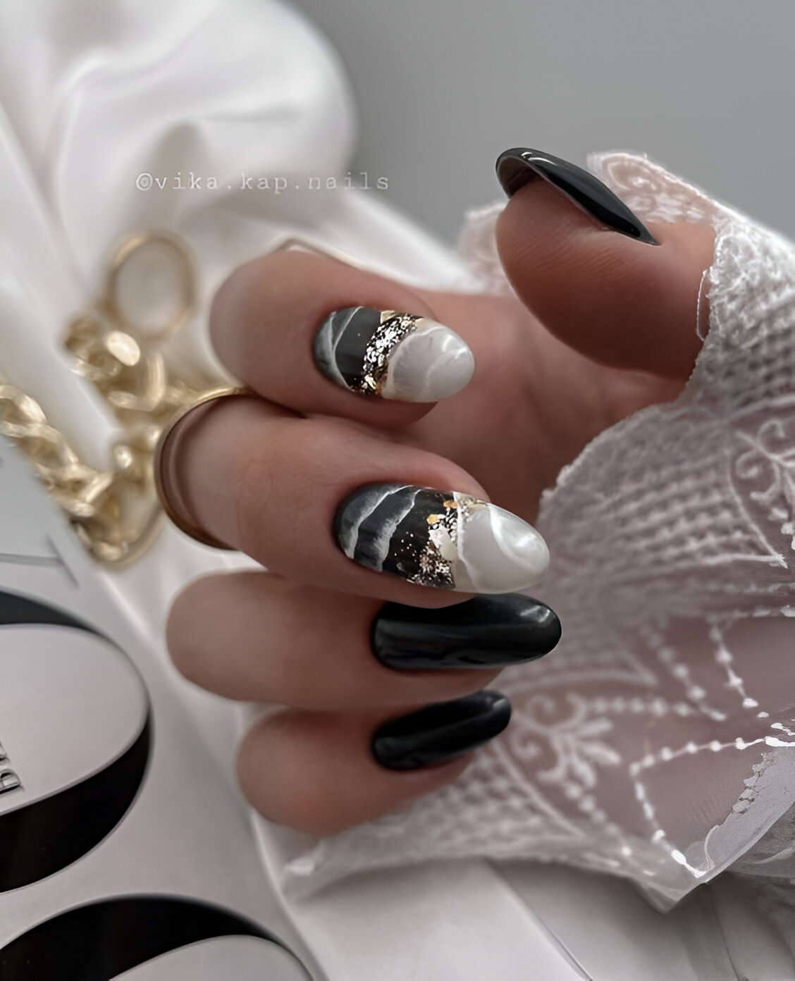 Marbled White And Black Nail Designs