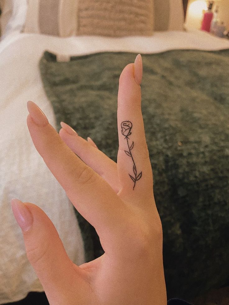 Mini Rose Finger Tattoo