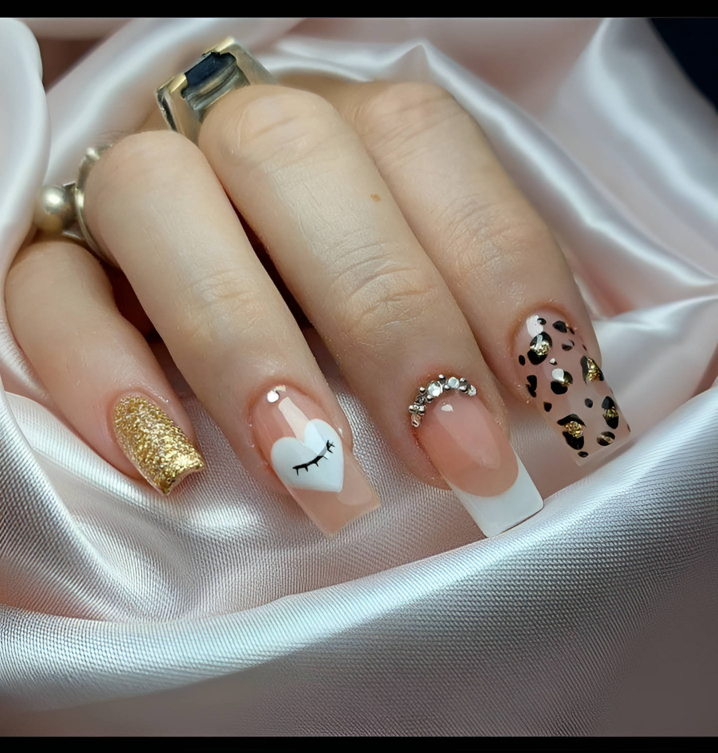 Nude Accent Nails With Leopard Pattern