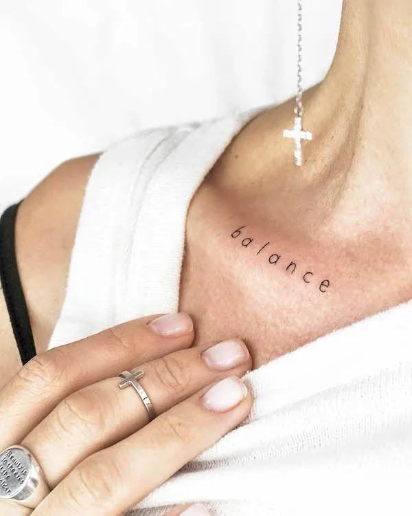 One-Worded Collarbone Tattoo