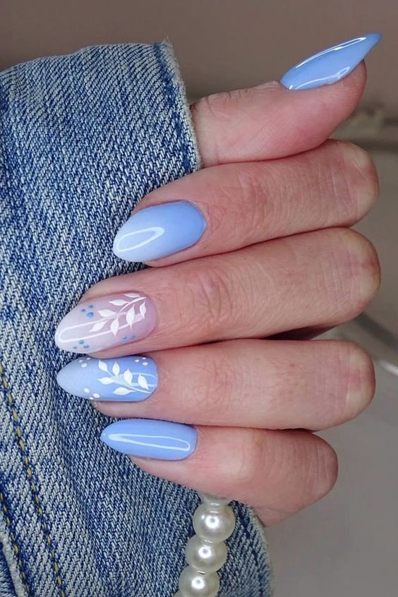 Short Pastel Blue Nails With Flowers