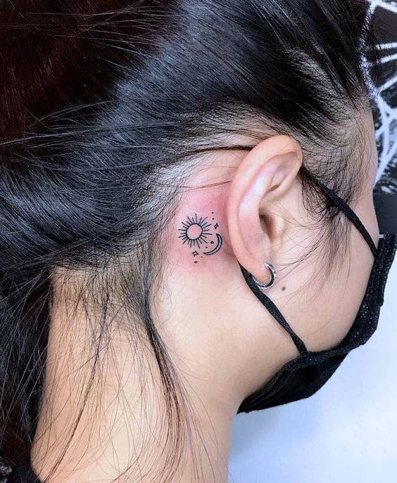 Sun And Moon Behind-The-Ear Tattoos
