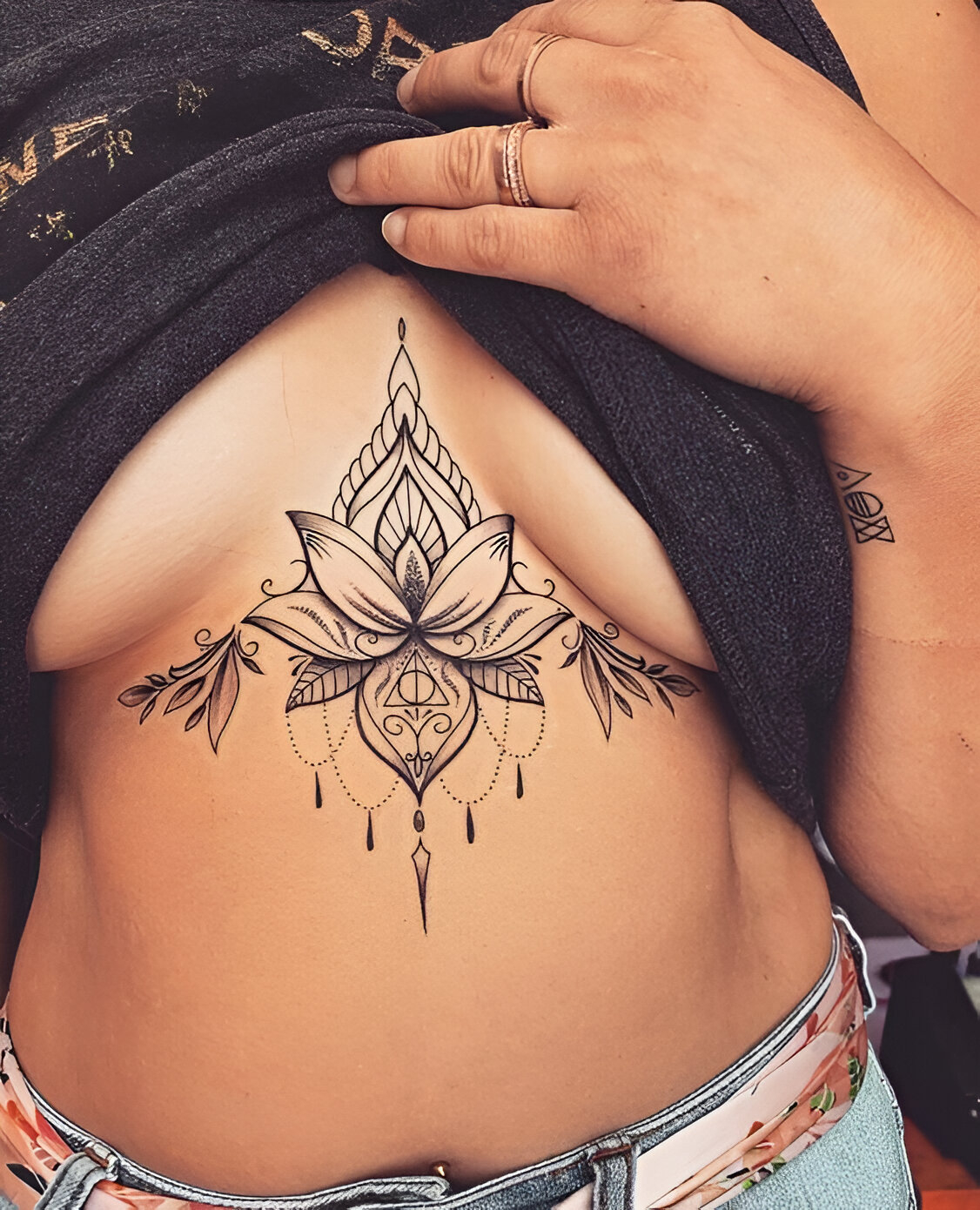 Tribal Lotus Underboob Tattoo