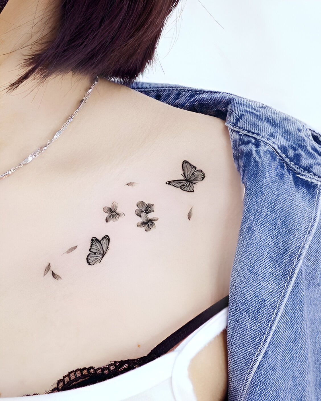 Black And White Collarbone Butterfly Tattoos