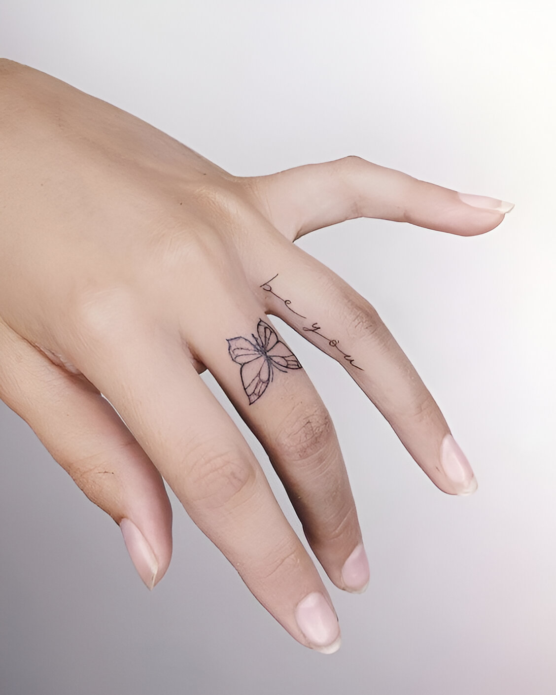 Dainty Butterfly Tattoos On Finger