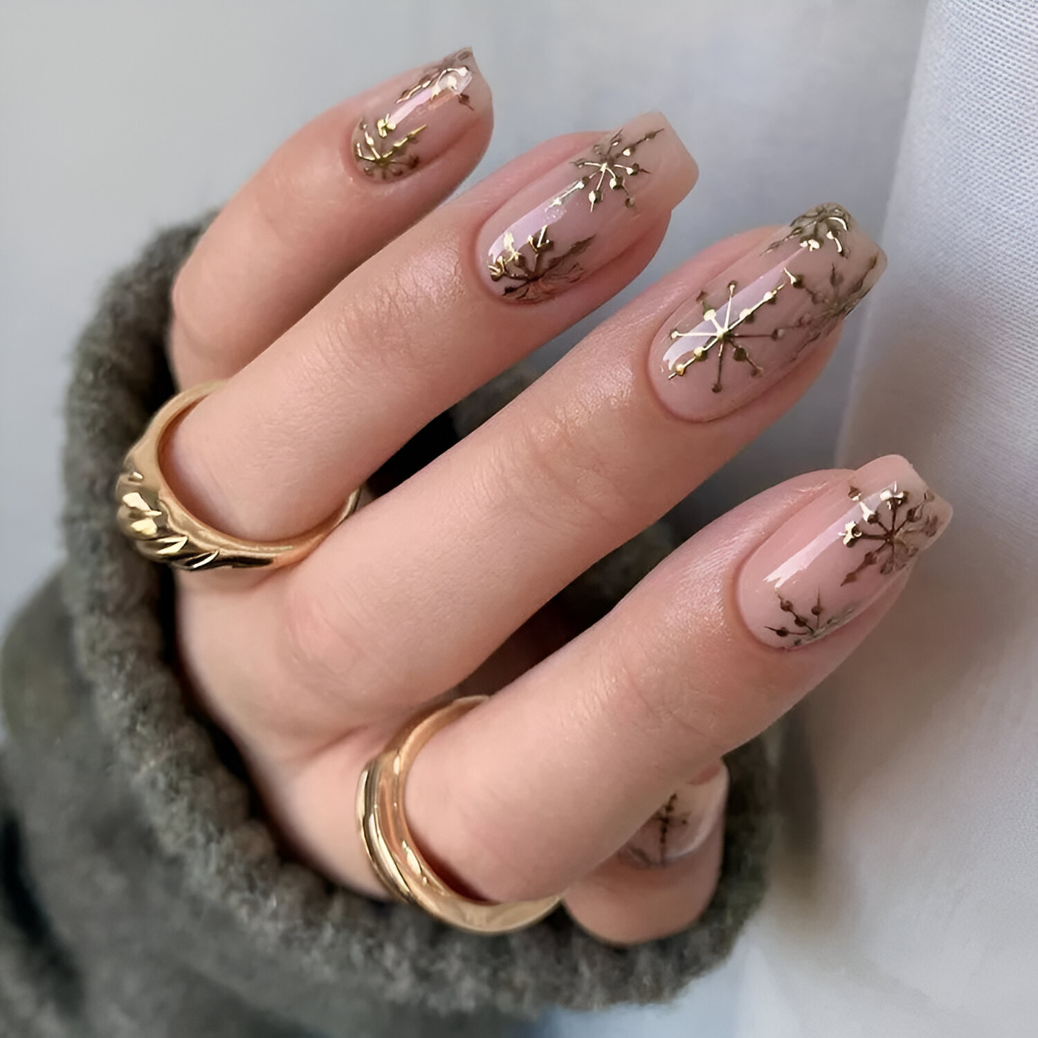 Gold Holiday Nails With Snowflakes