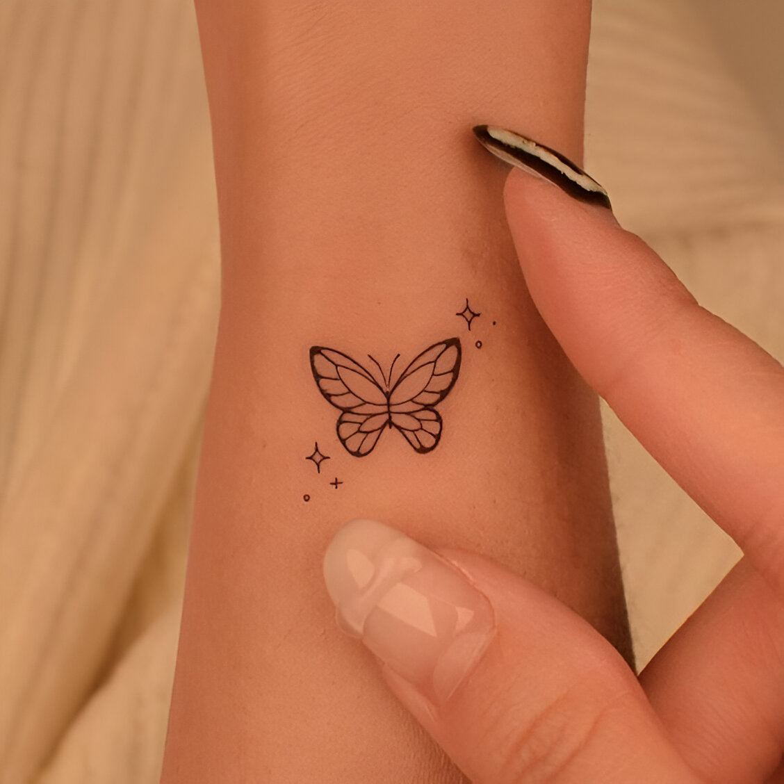 Simple Wrist Tattoos With Butterfly Design