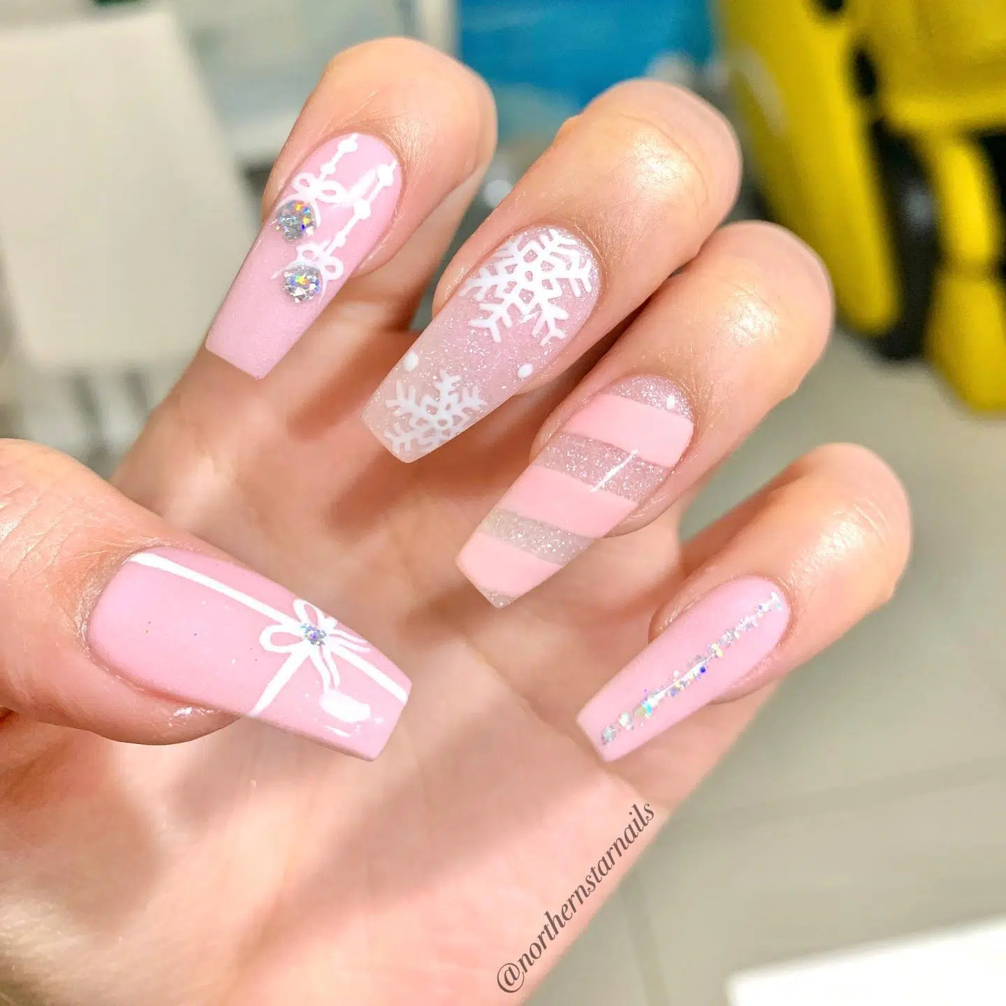 White Christmas Nails With Pink Accent
