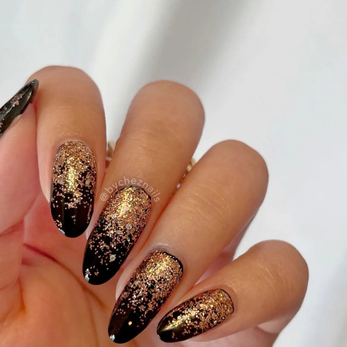 Black And And Glittered New Year's Eve Nails