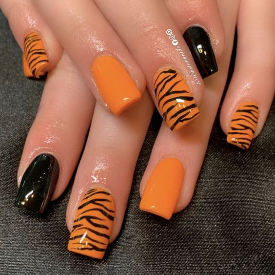 Bold Tiger Print Nail Ideas 1