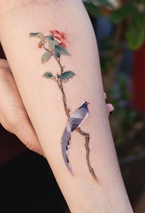 Bird With Flower Tattoos 4