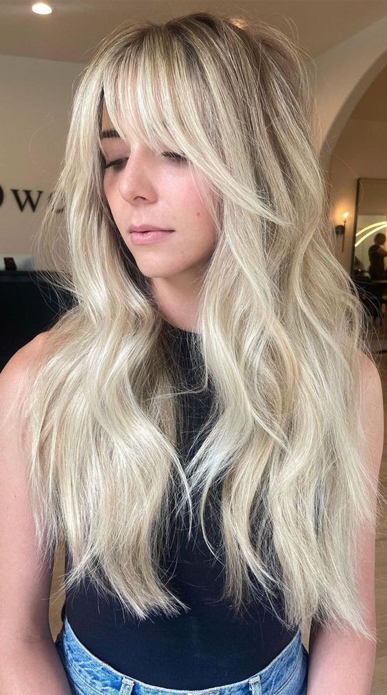 Blonde Hair With Wispy Curtain Bangs 8