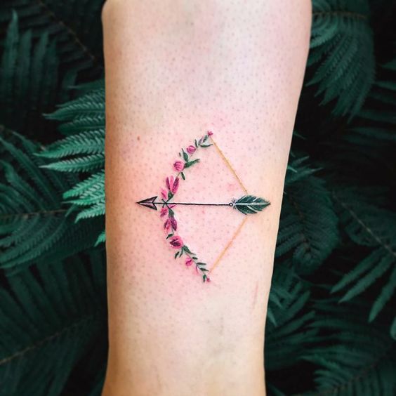 Bow And Arrow Meaningful Tiny Tattoo Ideas 2