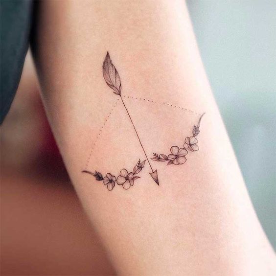 Bow And Arrow Meaningful Tiny Tattoo Ideas 6