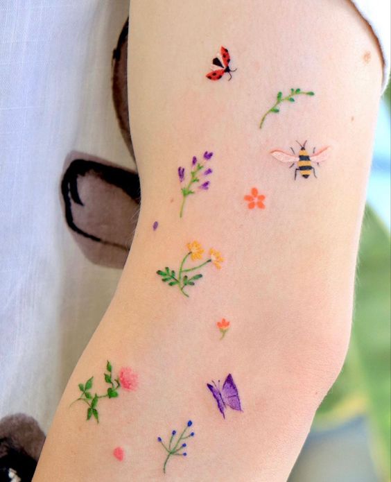 Multiple Colorful Flower Tattoos 6