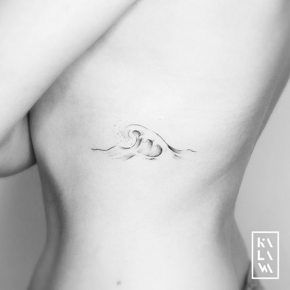 Sea Wave Tattoos On Rib 4