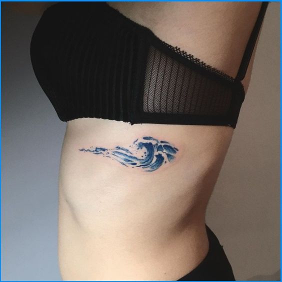 Sea Wave Tattoos On Rib 5