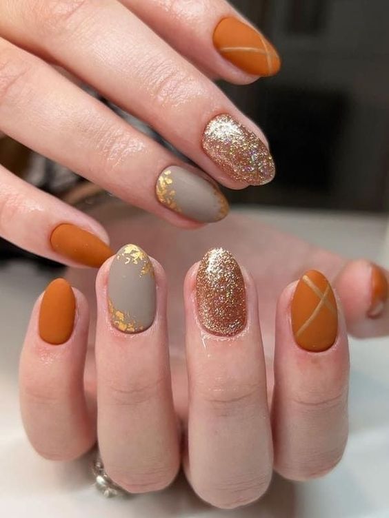 Warm Tone Short Nails With Gold Accents 6