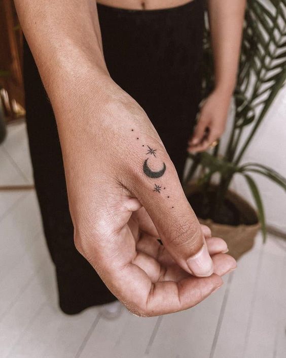 Crescent Moon And Star Finger Tattoo Designs 5