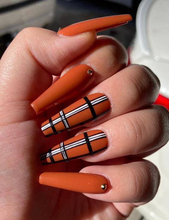 Plaid Orange And Black Nails 7