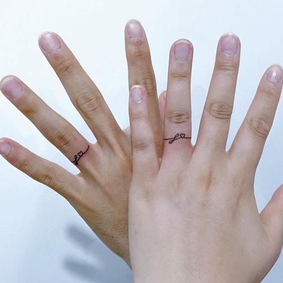 Ring Finger Tattoo Designs 9