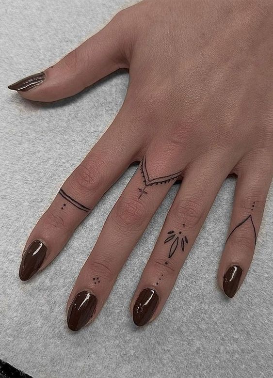 Rosary Finger Tattoos 1