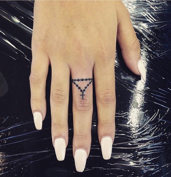 Rosary Finger Tattoos 5