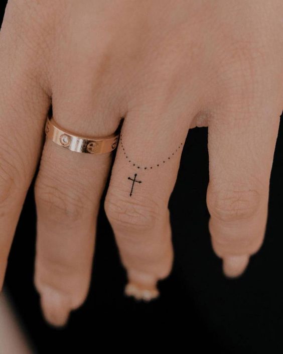 Rosary Finger Tattoos 7