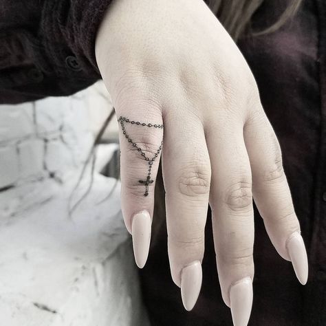 Rosary Finger Tattoos 9